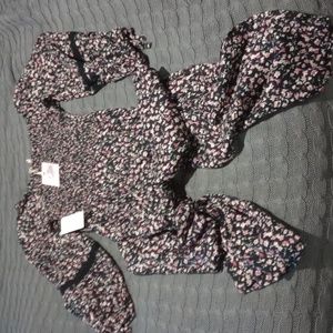 Jessica Simpson girls size L(12) black with flowers Romper. Super cute and comfy